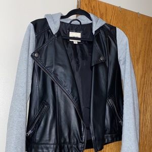 Leather jacket with cloth sleeves and hood.